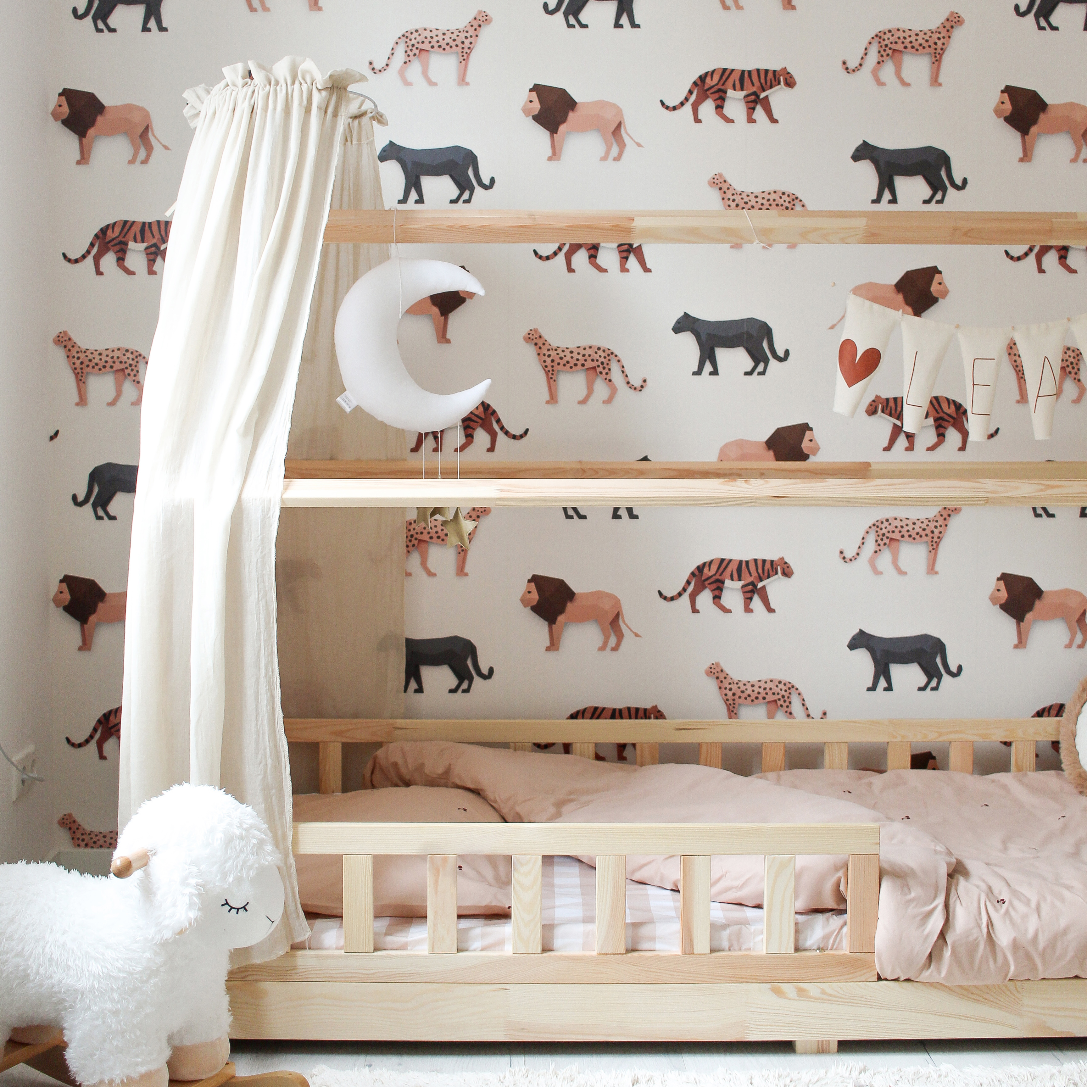 Nursery with big cats wallpaper