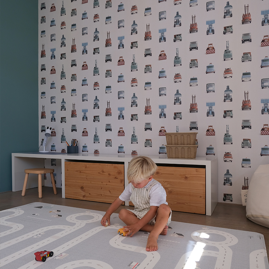 Playroom with work vehicles wallpaper